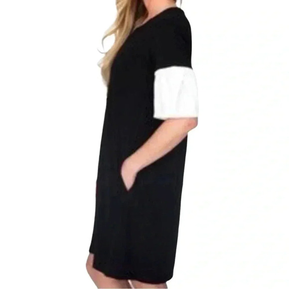 Agnes & Dora Black Dress with White Inverted Pleat Sleeves, Side Pockets - Picture 3 of 3